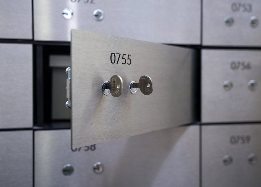 Open safe deposit box 0755 showing the dual client and facility keys